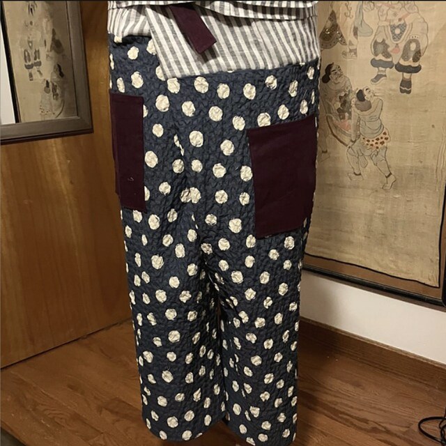 Handmade polka-dot seersucker trousers with burgundy pockets, made by a customer